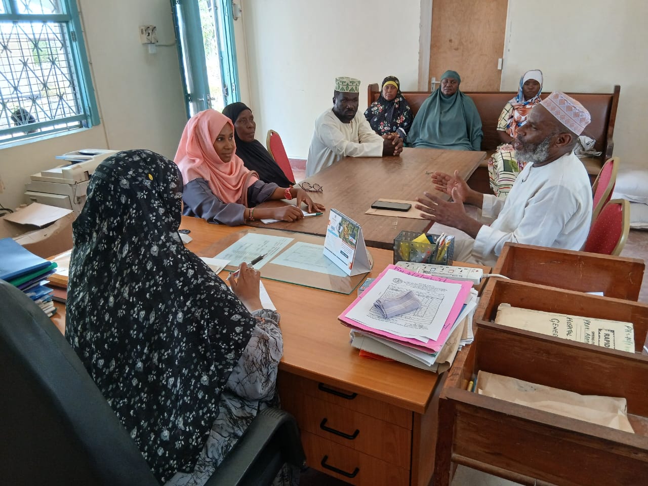 PCF representatives in a coordination meeting with government and partner officials